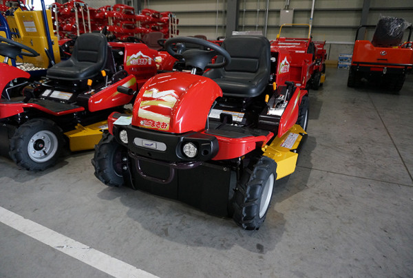 Photo: A riding mower awaits shipment after inspection