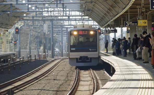 写真：経堂駅に入線する電車