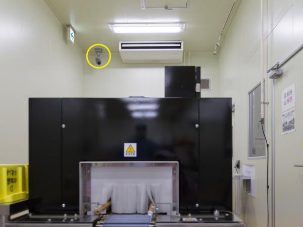 写真：製品梱包装置の稼働状況をモニタリング