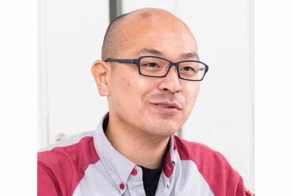 写真：「TOUGHPADのおかげで現場のIT化を推進することができました」と語る、マルハニチロ物流 関東支社 川崎第三物流センター 業務課長の高橋正男様