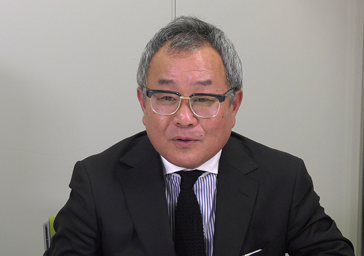 写真:購買部 課長 佐伯勝昭様