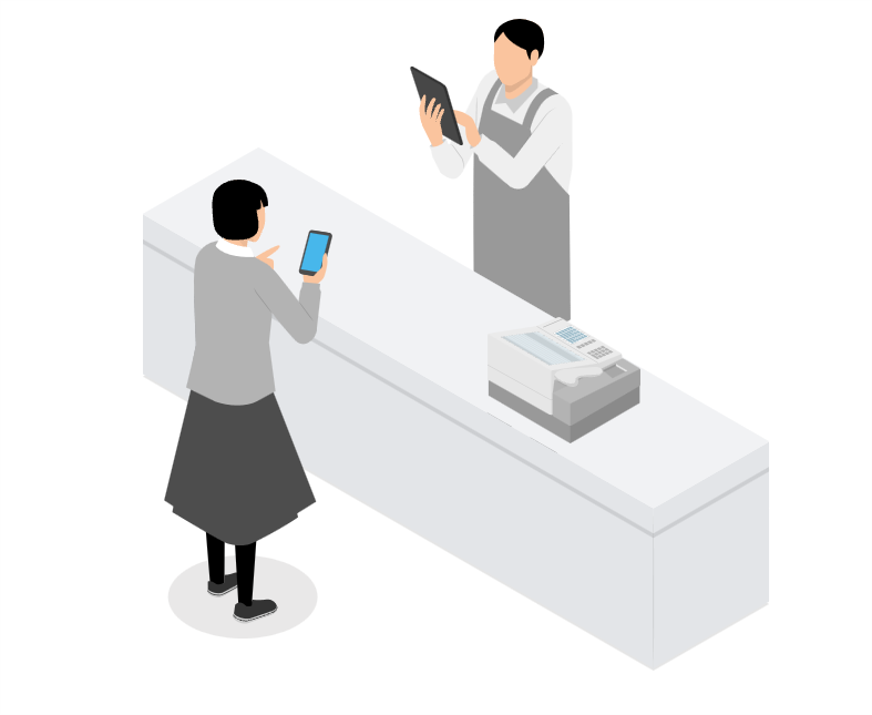 カウンター越しに向き合う従業員と利用者